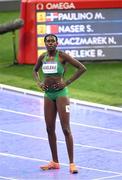 9 August 2024; Rhasidat Adeleke of Team Ireland reacts after finishing fourth in the women's 400m final at the Stade de France during the 2024 Paris Summer Olympic Games in Paris, France. Photo by Stephen McCarthy/Sportsfile