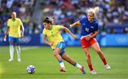 10 August 2024; Duda Sampaio of Team Brazil in action against Lindsey Horan of Team United States during the women's gold medal match between Team Brazil and Team United States at Parc des Princes during the 2024 Paris Summer Olympic Games in Paris, France. Photo by Stephen McCarthy/Sportsfile