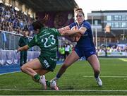 10 August 2024; Katie Whelan of Leinster evades the tackle of Connacht's Emily Foley on her way to scoring her side's sixth try during the Vodafone Women’s Interprovincial Championship Round One match between Leinster and Connacht at Energia Park in Dublin. Photo by Seb Daly/Sportsfile