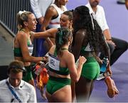 10 August 2024; The Team Ireland relay team, from left, Sharlene Mawdsley, Phil Healy, Sophie Becker, and Rhasidat Adeleke react after finishing fourth the women's 4 x 400m relay final at the Stade de France during the 2024 Paris Summer Olympic Games in Paris, France. Photo by Brendan Moran/Sportsfile
