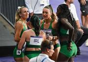10 August 2024; The Team Ireland relay team, from left, Sharlene Mawdsley, Phil Healy, Sophie Becker, and Rhasidat Adeleke react after finishing fourth the women's 4 x 400m relay final at the Stade de France during the 2024 Paris Summer Olympic Games in Paris, France. Photo by Brendan Moran/Sportsfile