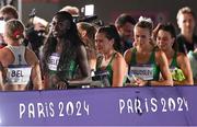 10 August 2024; The Ireland team, from left, Rhasidat Adeleke, Phil Healy, Sharlene Mawdsley and Sophie Becker after finishing 4th in the women's 4x400 relay final at the Stade de France during the 2024 Paris Summer Olympic Games in Paris, France. Photo by Stephen McCarthy/Sportsfile
