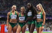 10 August 2024; The Ireland team, from left, Sophie Becker, Phil Healy, Rhasidat Adeleke and Sharlene Mawdsley after the women's 4x400 relay final at the Stade de France during the 2024 Paris Summer Olympic Games in Paris, France. Photo by Sportsfile