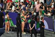 10 August 2024; The Team Ireland relay team, from left, Phil Healy, Sharlene Mawdsley, Sophie Becker, and Rhasidat Adeleke with fans after the women's 4 x 400m relay final at the Stade de France during the 2024 Paris Summer Olympic Games in Paris, France. Photo by Brendan Moran/Sportsfile