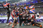 10 August 2024; Men's 4 x 400m Bronze medalists Alex Haydock-Wilson, Matthew Hudson-Smith, Lewis Davey and Charles Dobson with Women's 4 x 400m Bronze medalist Victoria Ohuruogu, Laviai Nielsen, Nicole Yeargin and Amber Anning of Team Great Britain at the Stade de France during the 2024 Paris Summer Olympic Games in Paris, France. Photo by Sam Barnes/Sportsfile