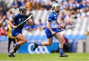 11 August 2024; Laura Marie Maher of Laois in action against Ciara Ryan of Tipperary during the All-Ireland Premier Junior Camogie Championship final between Laois and Tipperary at Croke Park in Dublin. Photo by Piaras Ó Mídheach/Sportsfile