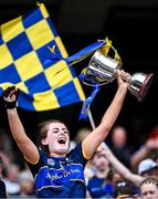 11 August 2024; Tipperary captain Sinéad Meagher lifts the Kathleen Mills cup after her side's victory in the All-Ireland Premier Junior Camogie Championship final between Laois and Tipperary at Croke Park in Dublin. Photo by Piaras Ó Mídheach/Sportsfile