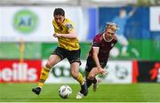 11 August 2024; Kian Leavy of St Patrick's Athletic in action against Conor McCormack of Galway United during the SSE Airtricity Men's Premier Division match between Galway United and St Patrick's Athletic at Eamonn Deacy Park in Galway. Photo by Tyler Miller/Sportsfile