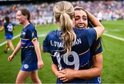 11 August 2024; Tipperary players Ciara Brennan and Emma O'Halloran, 19, celebrate after their side's victory in the All-Ireland Premier Junior Camogie Championship final between Laois and Tipperary at Croke Park in Dublin. Photo by Piaras Ó Mídheach/Sportsfile