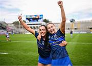 11 August 2024; Tipperary players Ciara Brennan and Emma O'Halloran, right, celebrate after their side's victory in the All-Ireland Premier Junior Camogie Championship final between Laois and Tipperary at Croke Park in Dublin. Photo by Piaras Ó Mídheach/Sportsfile