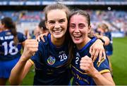 11 August 2024; Tipperary players Eimear Fogarty, left, and Lorna Ryan celebrate after their side's victory in the All-Ireland Premier Junior Camogie Championship final between Laois and Tipperary at Croke Park in Dublin. Photo by Piaras Ó Mídheach/Sportsfile