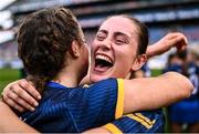 11 August 2024; Tipperary players Lorna Ryan, right, and Eimear Fogarty celebrate after their side's victory in the All-Ireland Premier Junior Camogie Championship final between Laois and Tipperary at Croke Park in Dublin. Photo by Piaras Ó Mídheach/Sportsfile