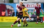 11 August 2024; Kian Leavy of St Patrick's Athletic in action against Vincent Borden of Galway United during the SSE Airtricity Men's Premier Division match between Galway United and St Patrick's Athletic at Eamonn Deacy Park in Galway. Photo by Tyler Miller/Sportsfile