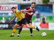 11 August 2024; Kian Leavy of St Patrick's Athletic in action against Greg Cunningham of Galway United during the SSE Airtricity Men's Premier Division match between Galway United and St Patrick's Athletic at Eamonn Deacy Park in Galway. Photo by Tyler Miller/Sportsfile