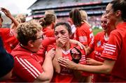 11 August 2024; Fiona Nelligan of Cork, centre, who scored the winning point, celebrates after her side's victory in the All-Ireland Premier Intermediate Camogie Championship final between Cork and Kilkenny at Croke Park in Dublin. Photo by Piaras Ó Mídheach/Sportsfile