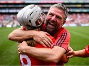 11 August 2024; Cork manager Donie Daly celebrates with Olivia McAllen after their side's victory in the All-Ireland Premier Intermediate Camogie Championship final between Cork and Kilkenny at Croke Park in Dublin. Photo by Piaras Ó Mídheach/Sportsfile
