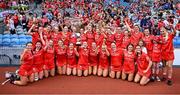 11 August 2024; Cork players celebrate after their side's victory in the All-Ireland Premier Intermediate Camogie Championship final between Cork and Kilkenny at Croke Park in Dublin. Photo by Piaras Ó Mídheach/Sportsfile