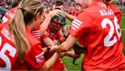 11 August 2024; Fiona Nelligan of Cork, centre, who scored the winning point, celebrates with team-mates after her side's victory in the All-Ireland Premier Intermediate Camogie Championship final between Cork and Kilkenny at Croke Park in Dublin. Photo by Piaras Ó Mídheach/Sportsfile