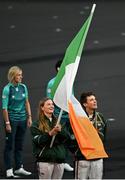11 August 2024; Team Ireland flagbearers Mona McSharry and Fintan McCarthy during the closing ceremony of the 2024 Paris Summer Olympic Games at Stade de France in Paris, France. Photo by David Fitzgerald/Sportsfile