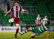 11 August 2024; Andrew Quinn of Drogheda United in action against Marc McNulty of Shamrock Rovers during the SSE Airtricity Men's Premier Division match between Shamrock Rovers and Drogheda United at Tallaght Stadium in Dublin. Photo by Harry Murphy/Sportsfile
