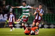11 August 2024; Marc McNulty of Shamrock Rovers in action against Drogheda United goalkeeper Luke Dennison during the SSE Airtricity Men's Premier Division match between Shamrock Rovers and Drogheda United at Tallaght Stadium in Dublin. Photo by Harry Murphy/Sportsfile