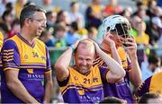 12 August 2024; Players, from left, former Wexford hurler Larry O’Gorman, former Kilkenny hurler Tommy Walsh and Limerick hurler Kyle Hayes before the Hurling for Cancer Research 2024 charity match at Netwatch Cullen Park in Carlow. Photo by Piaras Ó Mídheach/Sportsfile