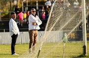12 August 2024; Former boxer Bernard Dunne, left, and Meath footballer manager Colm O'Rourke acting as umpires during the Hurling for Cancer Research 2024 charity match at Netwatch Cullen Park in Carlow. Photo by Piaras Ó Mídheach/Sportsfile