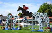 14 August 2024; McIain Ward of USA competing on Callas in the Minerva Stakes during the Dublin Horse Show 2024 at the RDS in Dublin. Photo by Shauna Clinton/Sportsfile