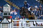 14 August 2024; Julien Gonin of France competing on Valou du Lys in the Sport Ireland Classic during the Dublin Horse Show 2024 at the RDS in Dublin. Photo by Shauna Clinton/Sportsfile