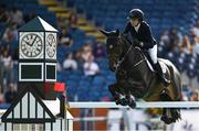 14 August 2024; Erica Swartz Ryan of Sweden competing on Cavicii Z in the Sport Ireland Classic during the Dublin Horse Show 2024 at the RDS in Dublin. Photo by Shauna Clinton/Sportsfile