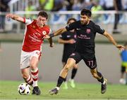 15 August 2024; Kian Leavy of St Patrick's Athletic, left, in action during the UEFA Conference League third qualifying round second leg match between Sabah and St Patrick's Athletic at Alinja Stadium in Baku, Azerbaijan. Photo by Ehtiram Jabi/Sportsfile