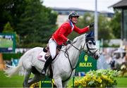 16 August 2024; Spencer Smith of USA, competing on Keeneland, celebrates their run during Aga Khan Day at the Dublin Horse Show at the RDS Arena in Dublin. Photo by David Fitzgerald/Sportsfile