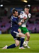 16 August 2024; Cathal O'Sullivan of Cork City in action against Cameron Dummigan of Derry City during the Sports Direct Men’s FAI Cup third round match between Cork City and Derry City at Turner's Cross in Cork. Photo by Piaras Ó Mídheach/Sportsfile