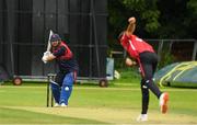 22 August 2024; Paul Stirling of Northern Knights is bowled to by Liam McCarthy of Munster Reds during the Cricket Ireland Inter-Provincial Cup match between Munster Reds and Northern Knights at The Mardyke in Cork. Photo by Matt Browne/Sportsfile