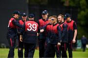 22 August 2024; Paul Stirling of Northern Knights, 39, is congratulated by his team-mates after his catch took the wicket of Brandon Kruger of Munster Reds during the Cricket Ireland Inter-Provincial Cup match between Munster Reds and Northern Knights at The Mardyke in Cork. Photo by Matt Browne/Sportsfile