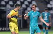 22 August 2024; Shamrock Rovers goalkeeper Leon Pohls, left and team-mate Dan Cleary in discussion during the UEFA Europa League play-off first leg match between PAOK and Shamrock Rovers at Toumba Stadium in Thessaloniki, Greece. Photo by John Moisiadis/Sportsfile