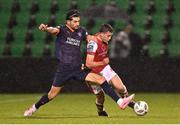 22 August 2024; Kian Leavy of St Patrick's Athletic in action against Onur Ergün of Basaksehir during the UEFA Conference League play-off first leg match between St Patrick's Athletic and Istanbul Basaksehir at Tallaght Stadium in Dublin. Photo by Stephen McCarthy/Sportsfile