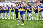 4 August 2024; Josie Keane, from Mullinahone, of the Tipperary team of 1974, who won the first All-Ireland Ladies Senior Football Championship final, as they are introduced to the crowd at half-time during the TG4 All-Ireland Ladies Football Intermediate Championship final match between Leitrim and Tyrone at Croke Park in Dublin. Photo by Piaras Ó Mídheach/Sportsfile
