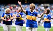 4 August 2024; Mary Burke, from Emly, of the Tipperary team of 1974, who won the first All-Ireland Ladies Senior Football Championship final, as they are introduced to the crowd at half-time during the TG4 All-Ireland Ladies Football Intermediate Championship final match between Leitrim and Tyrone at Croke Park in Dublin. Photo by Piaras Ó Mídheach/Sportsfile