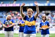 4 August 2024; Mary Burke, from Emly, of the Tipperary team of 1974, who won the first All-Ireland Ladies Senior Football Championship final, as they are introduced to the crowd at half-time during the TG4 All-Ireland Ladies Football Intermediate Championship final match between Leitrim and Tyrone at Croke Park in Dublin. Photo by Piaras Ó Mídheach/Sportsfile