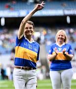 4 August 2024; Ann Bryan, from Moycarkey, of the Tipperary team of 1974, who won the first All-Ireland Ladies Senior Football Championship final, as they are introduced to the crowd at half-time during the TG4 All-Ireland Ladies Football Intermediate Championship final match between Leitrim and Tyrone at Croke Park in Dublin. Photo by Piaras Ó Mídheach/Sportsfile