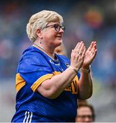 4 August 2024; Cáit O’Dwyer, from Moycarkey, of the Tipperary team of 1974, who won the first All-Ireland Ladies Senior Football Championship final, as they are introduced to the crowd at half-time during the TG4 All-Ireland Ladies Football Intermediate Championship final match between Leitrim and Tyrone at Croke Park in Dublin. Photo by Seb Daly/Sportsfile