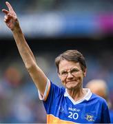 4 August 2024; Ann Bryan, from Moycarkey, of the Tipperary team of 1974, who won the first All-Ireland Ladies Senior Football Championship final, as they are introduced to the crowd at half-time during the TG4 All-Ireland Ladies Football Intermediate Championship final match between Leitrim and Tyrone at Croke Park in Dublin. Photo by Seb Daly/Sportsfile