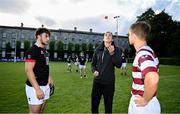 23 August 2024; Match ambassador Hannah Tyrrell performs the coin toss in the company of captains Danny Bennett of FSU and Peter Symington of Dublin University before a exhibition match between Florida State University Men’s Rugby Club and Dublin University at Trinity College in Dublin, ahead of the 2024 Aer Lingus College Football Classic match between Florida State and Georgia Tech at the Aviva Stadium this Saturday. Photo by Sam Barnes/Sportsfile