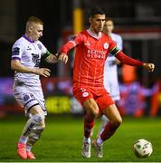 23 August 2024; Shane Griffin of Shelbourne in action against Ross Tierney of Bohemians during the SSE Airtricity Men's Premier Division match between Shelbourne and Bohemians at Tolka Park in Dublin. Photo by Tyler Miller/Sportsfile