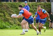 23 August 2024; Head coach Leo Cullen watches Harry Byrne, left, in action during a Leinster Rugby squad open training session at New Ross RFC in Wexford. Photo by Seb Daly/Sportsfile