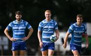 23 August 2024; Leinster players, from left, Harry Byrne, Ciarán Frawley and Luke McGrath during a Leinster Rugby squad open training session at New Ross RFC in Wexford. Photo by Seb Daly/Sportsfile