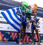 24 August 2024; Paul O'Donovan of Ireland celebrates on the podium with Antonios Papakonstantinou of Greece, and Niels Torre of Italy after the lightweight men's single sculls final at the World Rowing Championships at Royal Canadian Henley Rowing Course in St Catharines, Canada. Photo by Stephen Leithwood/Sportsfile