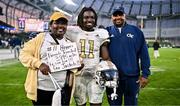 24 August 2024; Georgia Tech Yellow Jackets running back Jamal Haynes with his mother Annette and father Reggie after the 2024 Aer Lingus College Football Classic match between Florida State and Georgia Tech at Aviva Stadium in Dublin. Photo by Ben McShane/Sportsfile