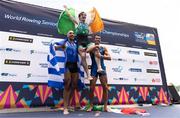 24 August 2024; Paul O'Donovan of Ireland celebrates on the podium with Antonios Papakonstantinou of Greece, and Niels Torre of Italy after the lightweight men's single sculls final at the World Rowing Championships at Royal Canadian Henley Rowing Course in St Catharines, Canada. Photo by Stephen Leithwood/Sportsfile